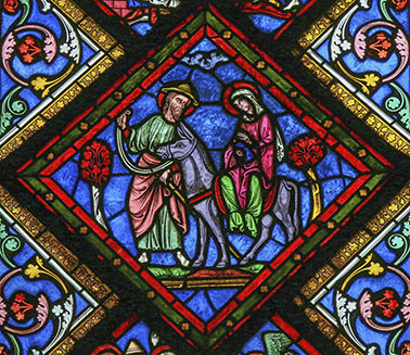 Stained glass window depicting Joseph, Mother Mary and Jesus in the cathedral of Caen, France, on February 12, 2013. This window was created more than 100 years ago, no property release is required.